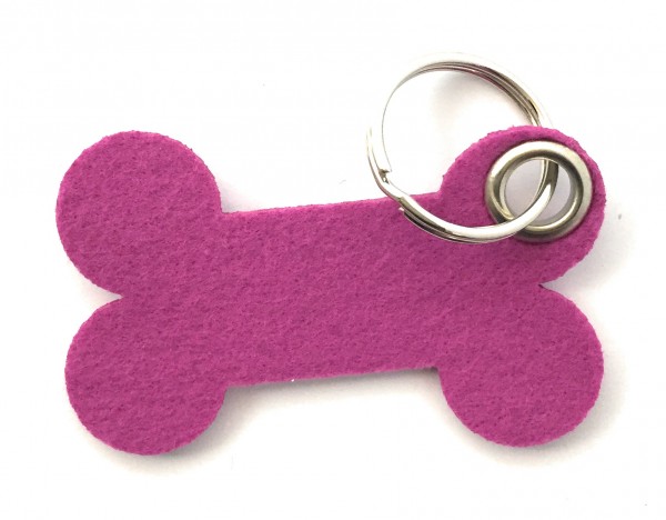 Knochen / Hundeknochen - Filz-Schlüsselanhänger - Farbe: magenta - optional mit Gravur / Aufdruck